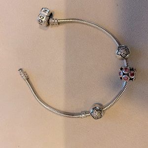 Pandora clasp sterling silver bracelet with charms
